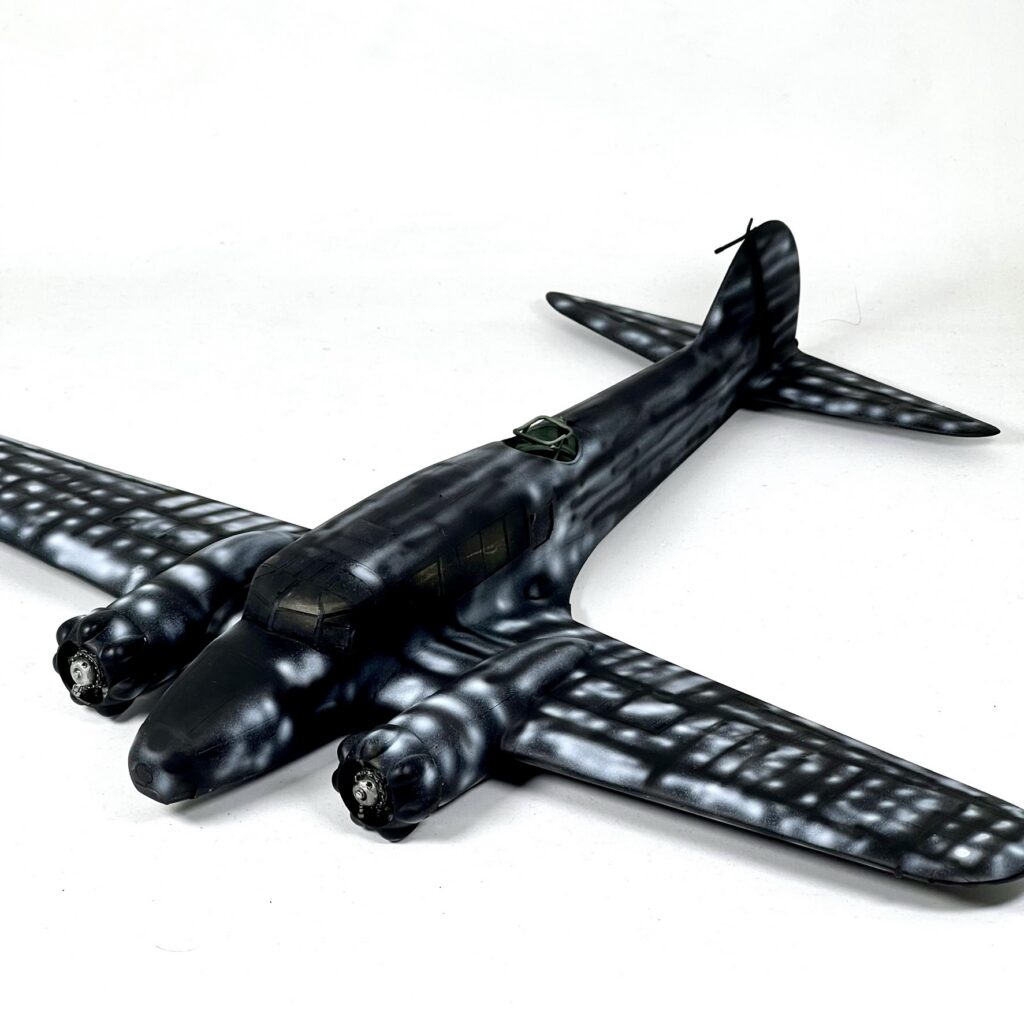 Airframe in black base coat with white mottling