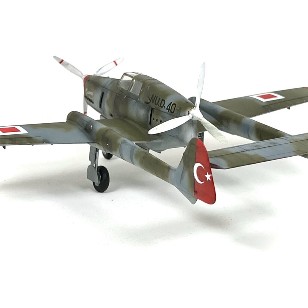 Twin-boom tail and imagined Turkish national markings.