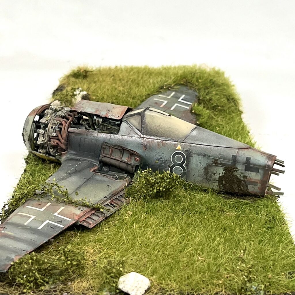 The wrecked Fw 190 in the grass from above