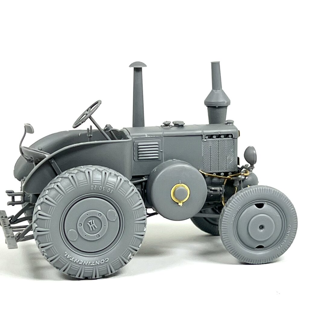 The tractor in primer from the side