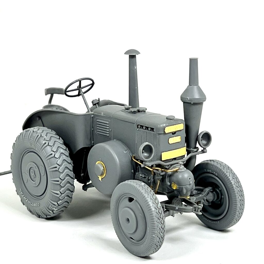 The tractor in primer from the rear quarter