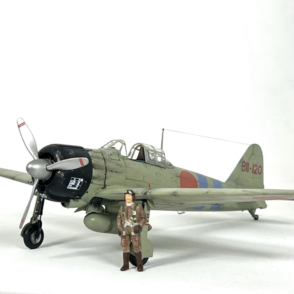 Finished Zero BII-120 with two blue fuselage bands and a pilot figure
