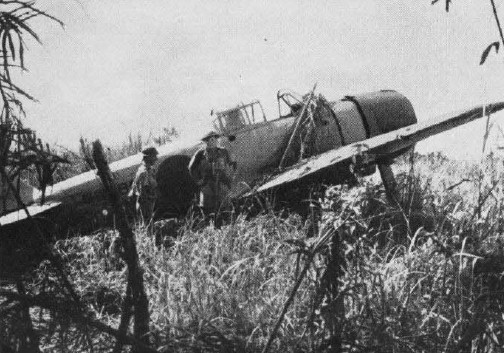 Terk edilmiş bir A6M3 Hamp avcı uçağı