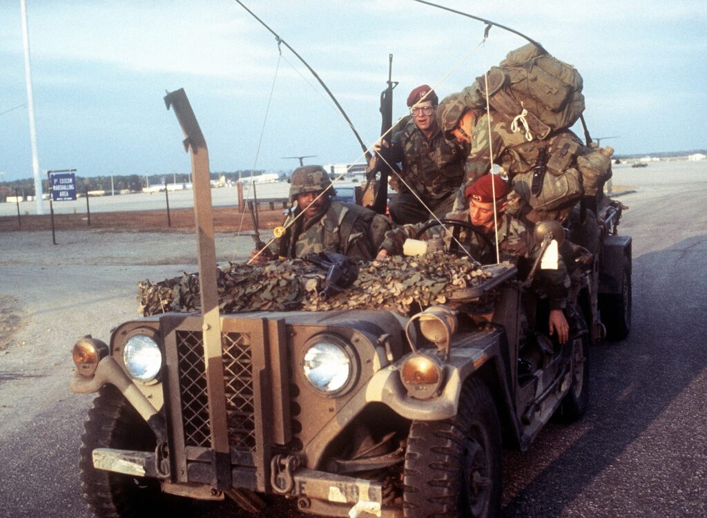 82nd Airborne paratroopers in an equipment-filled M151 before deploying to Grenada, 25 October 1983