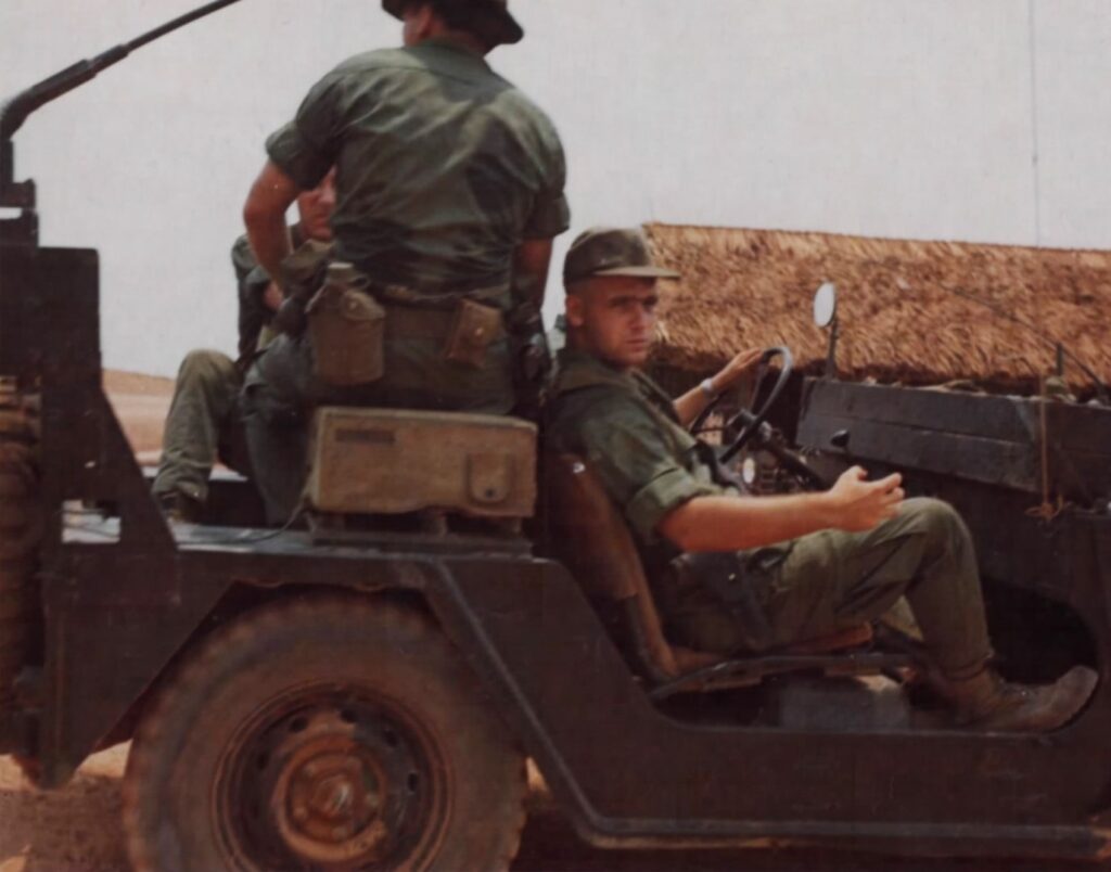 Recon patrol of Company A, 720th MP Battalion loading onto a quarter-ton truck, Vietnam, 1968