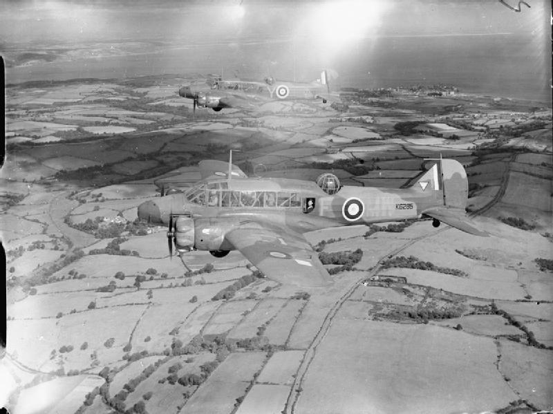 Two RAF Avro Anson Mk I aircraft in flight