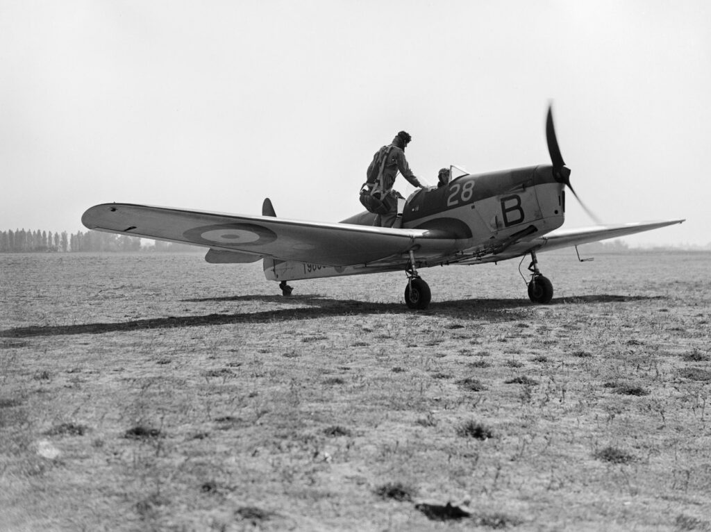 Royal Air Force Miles Magister trainer numbered 28 on the ground at Woodley, England, 1940