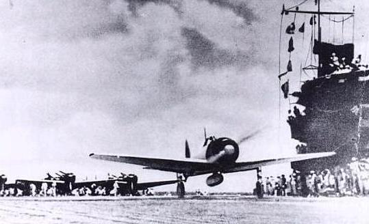 A Zero fighter starting its take-off run along the deck of the carrier Akagi